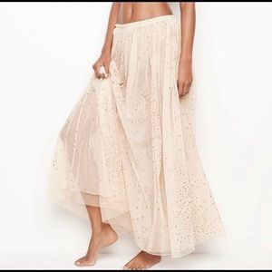 Blush glittery star sheer skirt.